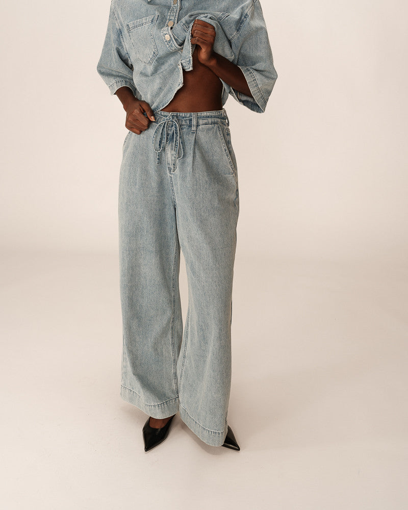 PANTALÓN DE MEZCLILLA POMPON